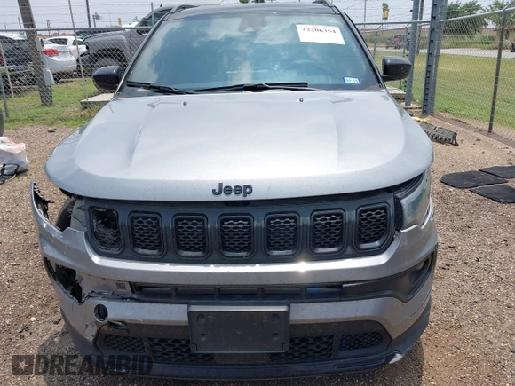 2023 Jeep Compass Latitude with VIN 3C4NJDBN5PT509999, listed as a IAAI auction lot 42206354 with 62,165 mi miles and . Bid and sale history available at DreamBid. Image 12.