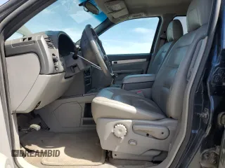2004 Buick Rendezvous with VIN 3G5DB03E64S507753, listed as a Copart auction lot 53326135 with 60,781 mi miles and Salvage Title. Bid and sale history available at DreamBid. Image 7.