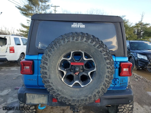 2022 Jeep Wrangler 4xe Unlimited Rubicon with VIN 1C4JJXR68NW190233, listed as a Copart auction lot 43017565 with 58,032 mi miles and Salvage Title. Bid and sale history available at carsss.com. Image 6.