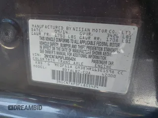 2015 Nissan Versa SV with VIN 3N1CN7AP5FL855424, listed as a IAAI auction lot 41974356 with 85,426 mi miles. Bid and sale history available at carsss.com. Image 9.