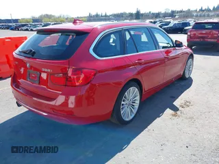 2014 BMW 3 Series 328i xDrive with VIN WBA3G7C58EKN36972, listed as a IAAI auction lot 41854952 with 112,201 mi miles and . Bid and sale history available at carsss.com. Image 4.