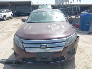 2012 Ford Fusion SE z VIN 3FAHP0HA1CR436376, wystawiony jako IAAI lot #41746291 z przebiegiem 148 748 mil mil oraz . Historia ofert i sprzedaży dostępna na DreamBid. Obrazek 13.