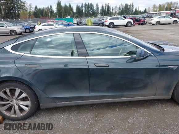 2013 Tesla Model S с VIN 5YJSA1CN1DFP27013, выставлен на аукционе IAAI как лот 42014212 с пробегом 65 858 миль миль и . История ставок и продаж доступна на DreamBid. Изображение 14.