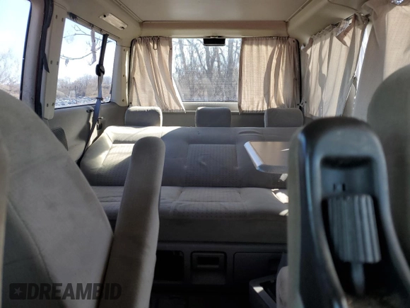 2001 Volkswagen EuroVan MV with VIN WV2NB47051H127991, listed as a Copart auction lot 45369215 with 72,763 mi miles and Salvage Title. Bid and sale history available at DreamBid. Image 10.