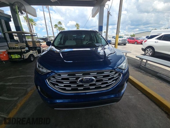 2021 Ford Edge Titanium with VIN 2FMPK3K98MBA53776, listed as a IAAI auction lot 42785493 with 114,856 mi miles and . Bid and sale history available at DreamBid. Image 2.