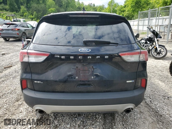 2020 Ford Escape SEL with VIN 1FMCU9H68LUB17865, listed as a Copart auction lot 58217685 with 113,569 mi miles and Salvage title. Bid and sale history available at DreamBid. Image 6.