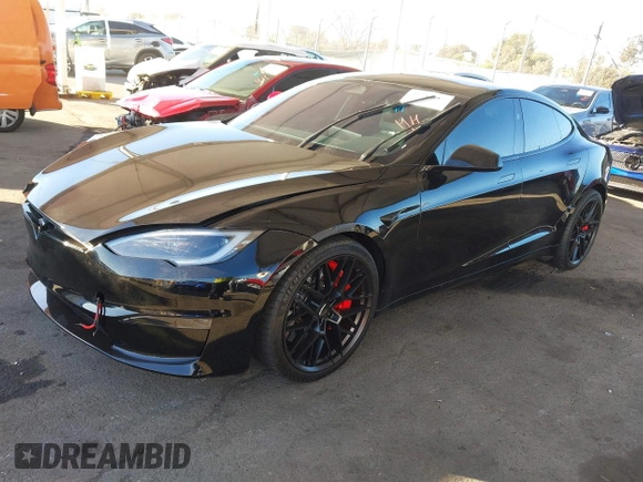 2023 Tesla Model S Plaid с VIN 5YJSA1E66PF518117, выставлен на аукционе IAAI как лот 41344515 с пробегом Не указан миль и . История ставок и продаж доступна на DreamBid. Изображение 17.
