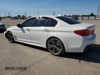 2018 BMW 5 Series M550i xDrive with VIN WBAJB9C51JB287233, listed as a Copart auction lot 55899505 with Not provided miles and Salvage title. Bid and sale history available at DreamBid. Image 2.