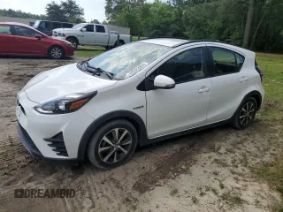 2018 Toyota Prius One z VIN JTDKDTB36J1613029, wystawiony jako Copart lot #53458235 z przebiegiem 100 397 mil mil oraz Czysty tytuł • Clean title. Historia ofert i sprzedaży dostępna na DreamBid. Obrazek 1.