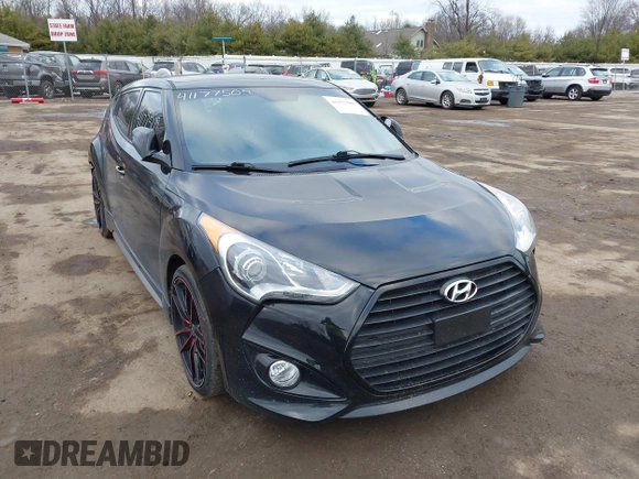 2013 Hyundai Veloster Turbo z VIN KMHTC6AE5DU151346, wystawiony jako IAAI lot #41177509 z przebiegiem 112 955 mil mil oraz . Historia ofert i sprzedaży dostępna na DreamBid. Obrazek 1.