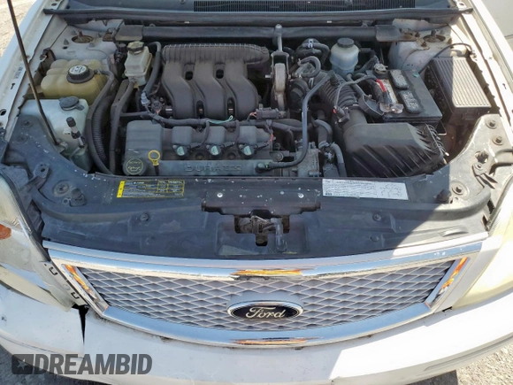 2005 Ford Five Hundred Limited с VIN 1FAHP281X5G134638, выставлен на аукционе Copart как лот 58256315 с пробегом Не указан миль и Чистый • Clean title. История ставок и продаж доступна на DreamBid. Изображение 11.