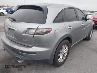 2003 Infiniti FX w/Options with VIN JNRBS08W33X402022, listed as a IAAI auction lot 42047472 with 203,438 mi miles. Bid and sale history available at carsss.com. Image 4.