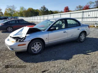 2002 Saturn SL with VIN 1G8ZK527X2Z248659, listed as a Copart auction lot 75981894 with 0 mi miles and Salvage Title. Bid and sale history available at carsss.com. Image 1.