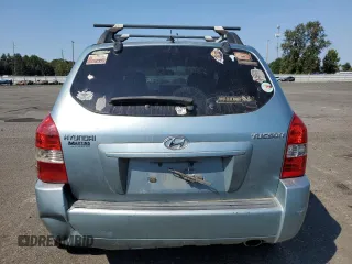 2009 Hyundai Tucson GLS with VIN KM8JM12B29U953176, listed as a Copart auction lot 70141174 with 77,132 mi miles and Salvage Title. Bid and sale history available at carsss.com. Image 6.