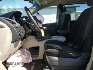 2014 Dodge Grand Caravan SXT with VIN 2C4RDGCG4ER478657, listed as a Copart auction lot 55691085 with 139,681 mi miles and Salvage Title. Bid and sale history available at DreamBid. Image 7.