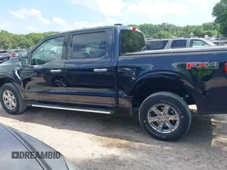 2021 Ford F-150 XL z VIN 1FTFW1E5XMFA57179, wystawiony jako IAAI lot #42561205 z przebiegiem 90 517 mil mil oraz . Historia ofert i sprzedaży dostępna na DreamBid. Obrazek 14.