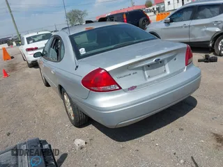 2006 Ford Taurus SE with VIN 1FAFP53U66A101635, listed as a IAAI auction lot 42067998 with 208,734 mi miles. Bid and sale history available at carsss.com. Image 3.