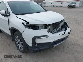 2022 Honda Pilot EX-L с VIN 5FNYF6H56NB098884, выставлен на аукционе IAAI как лот 41924421 с пробегом 68 868 миль миль и . История ставок и продаж доступна на DreamBid. Изображение 6.