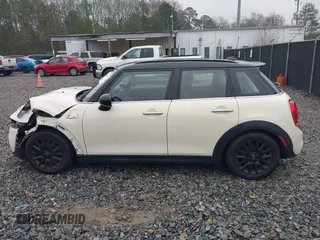2016 MINI Cooper Hardtop 4 Door S with VIN WMWXU3C52G2D30121, listed as a IAAI auction lot 41521841 with 82,334 mi miles. Bid and sale history available at carsss.com. Image 15.