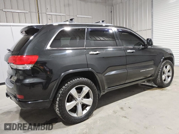 2014 Jeep Grand Cherokee Overland with VIN 1C4RJFCGXEC153250, listed as a Copart auction lot 51327195 with 132,282 mi miles and Clean Title. Bid and sale history available at DreamBid. Image 3.