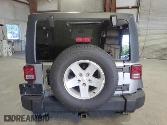 2014 Jeep Wrangler Unlimited Sport with VIN 1C4BJWDG6EL104739, listed as a Copart auction lot 62845045 with 167,155 mi miles and Clean title. Bid and sale history available at DreamBid. Image 6.