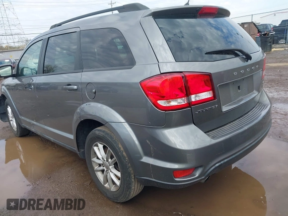 2013 Dodge Journey SXT with VIN 3C4PDCBG6DT506486, listed as a IAAI auction lot 41877271 with 196,597 mi miles and . Bid and sale history available at carsss.com. Image 3.