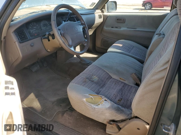 1995 Toyota T100 z VIN JT4VD22F4S0006698, wystawiony jako Copart lot #76022924 z przebiegiem 457 624 mil mil oraz Czysty tytuł • Clean title. Historia ofert i sprzedaży dostępna na DreamBid. Obrazek 8.