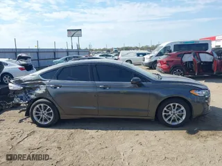 2020 Ford Fusion Hybrid SE with VIN 3FA6P0LU2LR143787, listed as a IAAI auction lot 40694206 with 92,621 mi miles. Bid and sale history available at carsss.com. Image 14.
