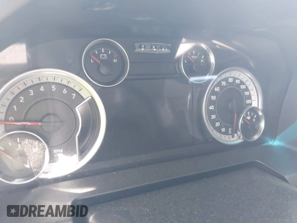 2015 Ram 1500 Big Horn z VIN 1C6RR7GT8FS549293, wystawiony jako IAAI lot #41833000 z przebiegiem Nie podano mil oraz . Historia ofert i sprzedaży dostępna na DreamBid. Obrazek 7.