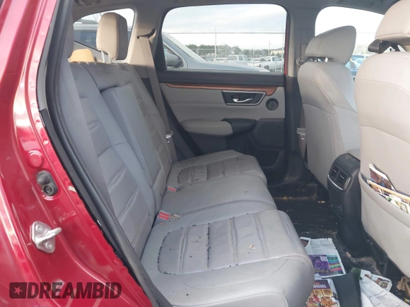 2020 Honda CR-V Touring with VIN 2HKRW2H96LH659793, listed as a IAAI auction lot 41145758 with 113,344 mi miles and . Bid and sale history available at DreamBid. Image 8.