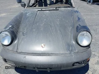 1988 Porsche 911 z VIN WP0EB0917JS161351, wystawiony jako IAAI lot #39908257 z przebiegiem Nie podano mil oraz . Historia ofert i sprzedaży dostępna na DreamBid. Obrazek 10.