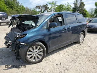 2011 Toyota Sienna XLE AAS with VIN 5TDYK3DCXBS056899, listed as a Copart auction lot 54797535 with 219,669 mi miles and Salvage title. Bid and sale history available at DreamBid. Image 1.