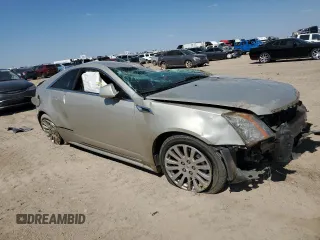 2013 Cadillac CTS Performance with VIN 1G6DC1E35D013318V, listed as a Copart auction lot 66292624 with 123,990 mi miles and Salvage title. Bid and sale history available at DreamBid. Image 4.
