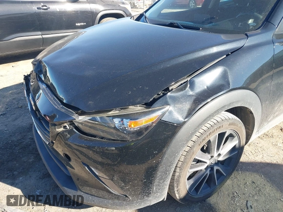 2018 Mazda CX-3 Touring with VIN JM1DKDC70J0325325, listed as a IAAI auction lot 40914334 with 63,978 mi miles. Bid and sale history available at carsss.com. Image 6.