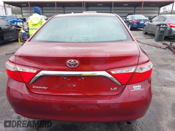 2015 Toyota Camry XLE with VIN 4T1BF1FK2FU982570, listed as a IAAI auction lot 41629755 with 245,224 mi miles. Bid and sale history available at carsss.com. Image 16.