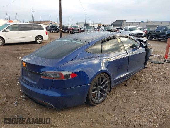 2021 Tesla Model S Long Range with VIN 5YJSA1E50MF432224, listed as a IAAI auction lot 41417130 with Not provided miles and . Bid and sale history available at DreamBid. Image 4.