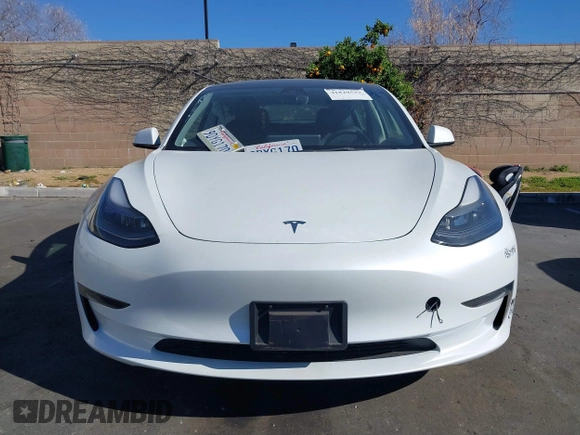 2023 Tesla Model 3 with VIN 5YJ3E1EA6PF411940, listed as a IAAI auction lot 41829537 with 32,877 mi miles and . Bid and sale history available at carsss.com. Image 11.