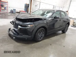2024 Mazda CX-30 2.5 S with VIN 3MVDMBAM0RM721141, listed as a IAAI auction lot 40984709 with 870 mi miles. Bid and sale history available at carsss.com. Image 2.