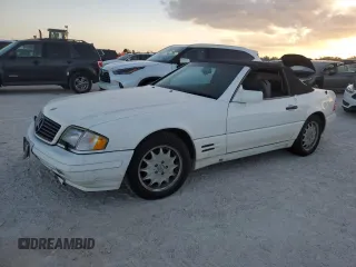 1996 Mercedes-Benz SL 320 with VIN WDBFA63F8TF136614, listed as a Copart auction lot 77565484 with Not provided miles and Salvage title. Bid and sale history available at DreamBid. Image 1.