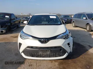 2021 Toyota C-HR LE with VIN JTNKHMBXXM1099019, listed as a IAAI auction lot 41525170 with 63,519 mi miles. Bid and sale history available at carsss.com. Image 12.