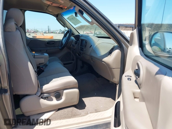 2002 Ford F-150 XL with VIN 1FTRX17272KE07014, listed as a IAAI auction lot 42381725 with 212,294 mi miles and . Bid and sale history available at DreamBid. Image 5.