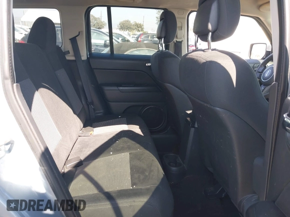 2013 Jeep Patriot Sport with VIN 1C4NJRBB8DD254107, listed as a IAAI auction lot 42170628 with 146,429 mi miles and . Bid and sale history available at carsss.com. Image 8.