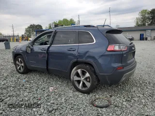 2020 Jeep Cherokee Limited with VIN 1C4PJLDB0LD653580, listed as a Copart auction lot 52700875 with 114,517 mi miles and Salvage title. Bid and sale history available at DreamBid. Image 2.