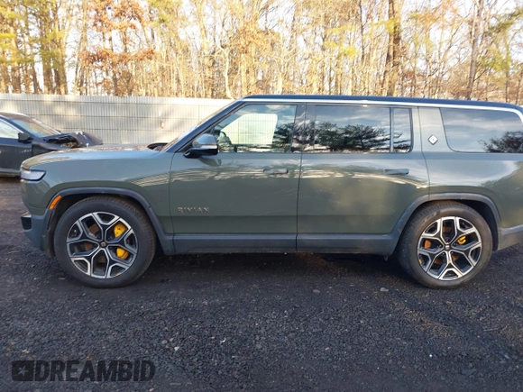 2022 Rivian R1S Launch Edition with VIN 7PDSGABL4NN000409, listed as a IAAI auction lot 41433164 with 39,603 mi miles. Bid and sale history available at carsss.com. Image 14.
