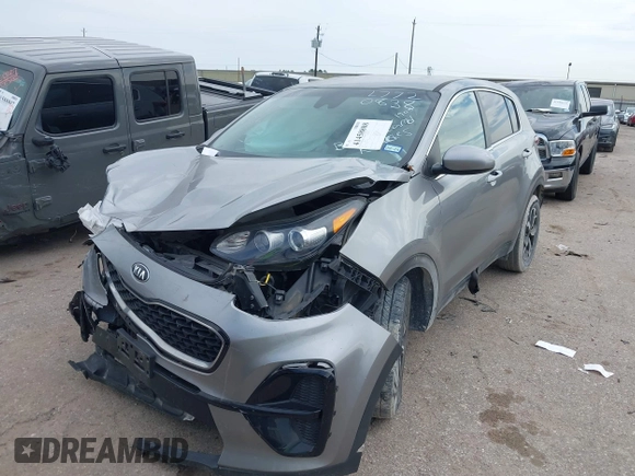 2020 Kia Sportage LX with VIN KNDPM3AC5L7720838, listed as a IAAI auction lot 41458808 with 52,689 mi miles and . Bid and sale history available at DreamBid. Image 19.