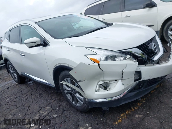 2016 Nissan Murano Platinum with VIN 5N1AZ2MG5GN126361, listed as a IAAI auction lot 41973077 with 124,624 mi miles and . Bid and sale history available at DreamBid. Image 1.