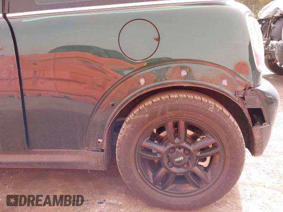 2013 MINI Hardtop z VIN WMWSU3C52DT690373, wystawiony jako IAAI lot #41777229 z przebiegiem 125 190 mil mil oraz . Historia ofert i sprzedaży dostępna na DreamBid. Obrazek 15.