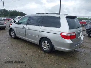 2007 Honda Odyssey EX with VIN 5FNRL38457B120170, listed as a IAAI auction lot 41960440 with 280,153 mi miles and . Bid and sale history available at DreamBid. Image 3.