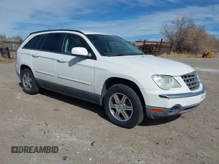 2007 Chrysler Pacifica Touring z VIN 2A8GM68X27R196197, wystawiony jako IAAI lot #41860142 z przebiegiem 131 361 mil mil oraz . Historia ofert i sprzedaży dostępna na DreamBid. Obrazek 1.