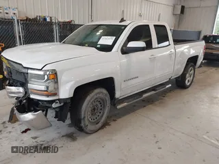 2018 Chevrolet Silverado 1500 LT with VIN 1GCRCREC0JZ204834, listed as a IAAI auction lot 41363579 with 135,247 mi miles and . Bid and sale history available at DreamBid. Image 17.